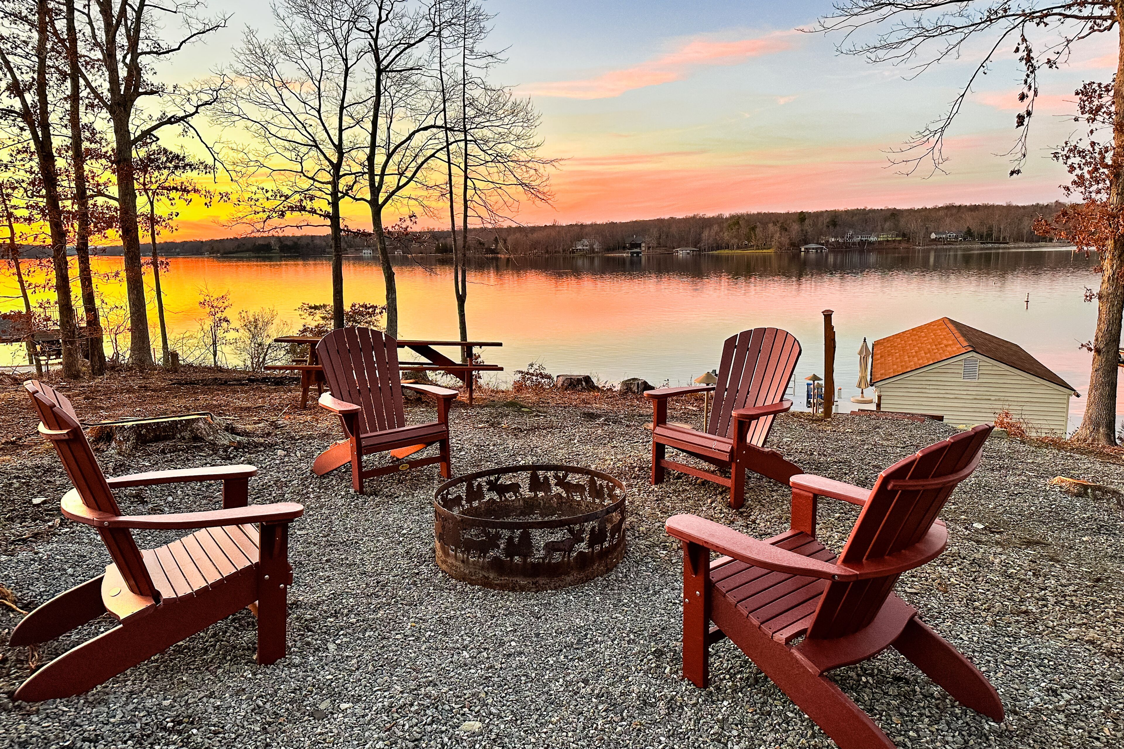 Centrally located lake house with deep-water dock, firepit, deck, AC, & W/D