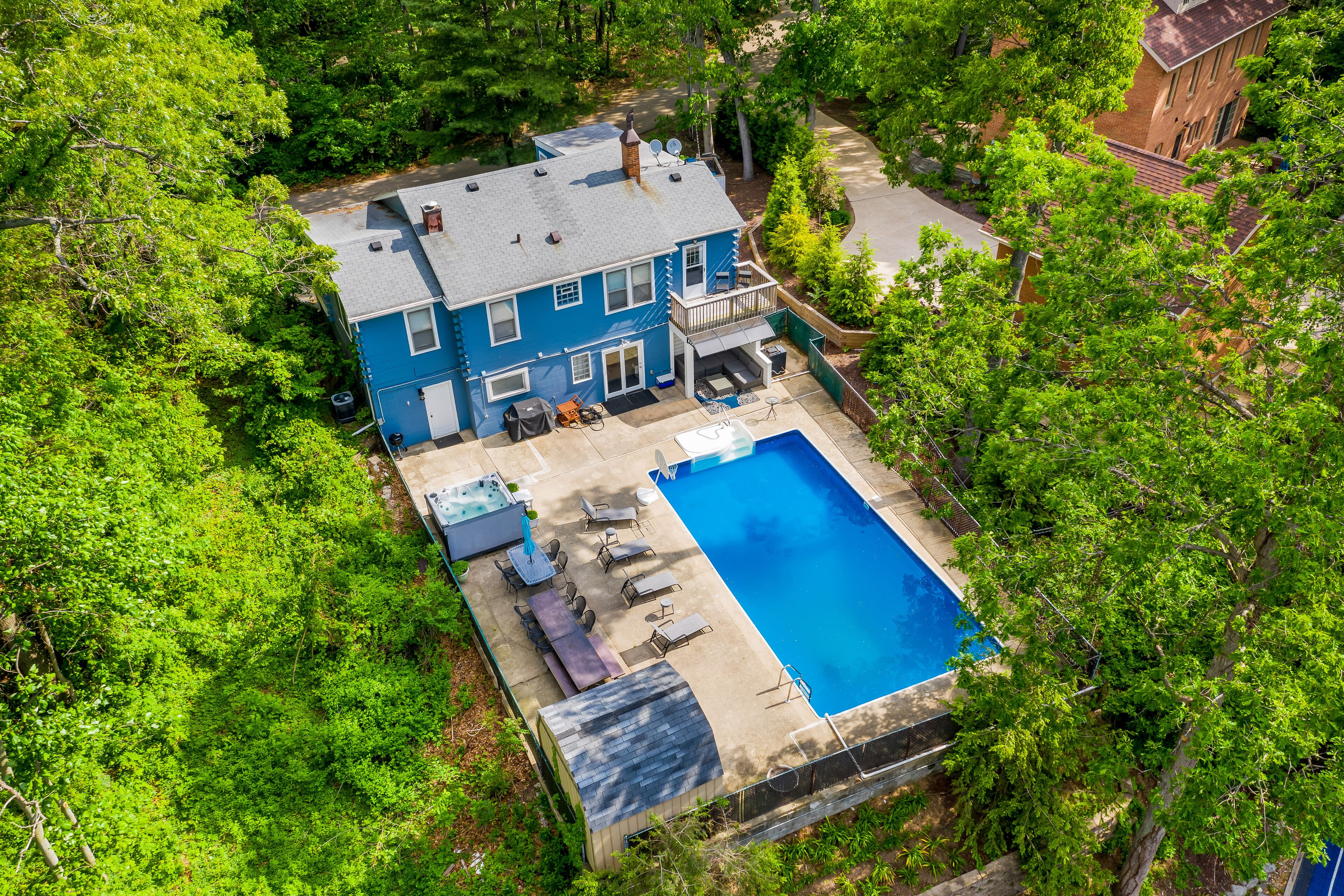 Spacious, dog-friendly home with a gas fireplace, pool, hot tub, & golf carts
