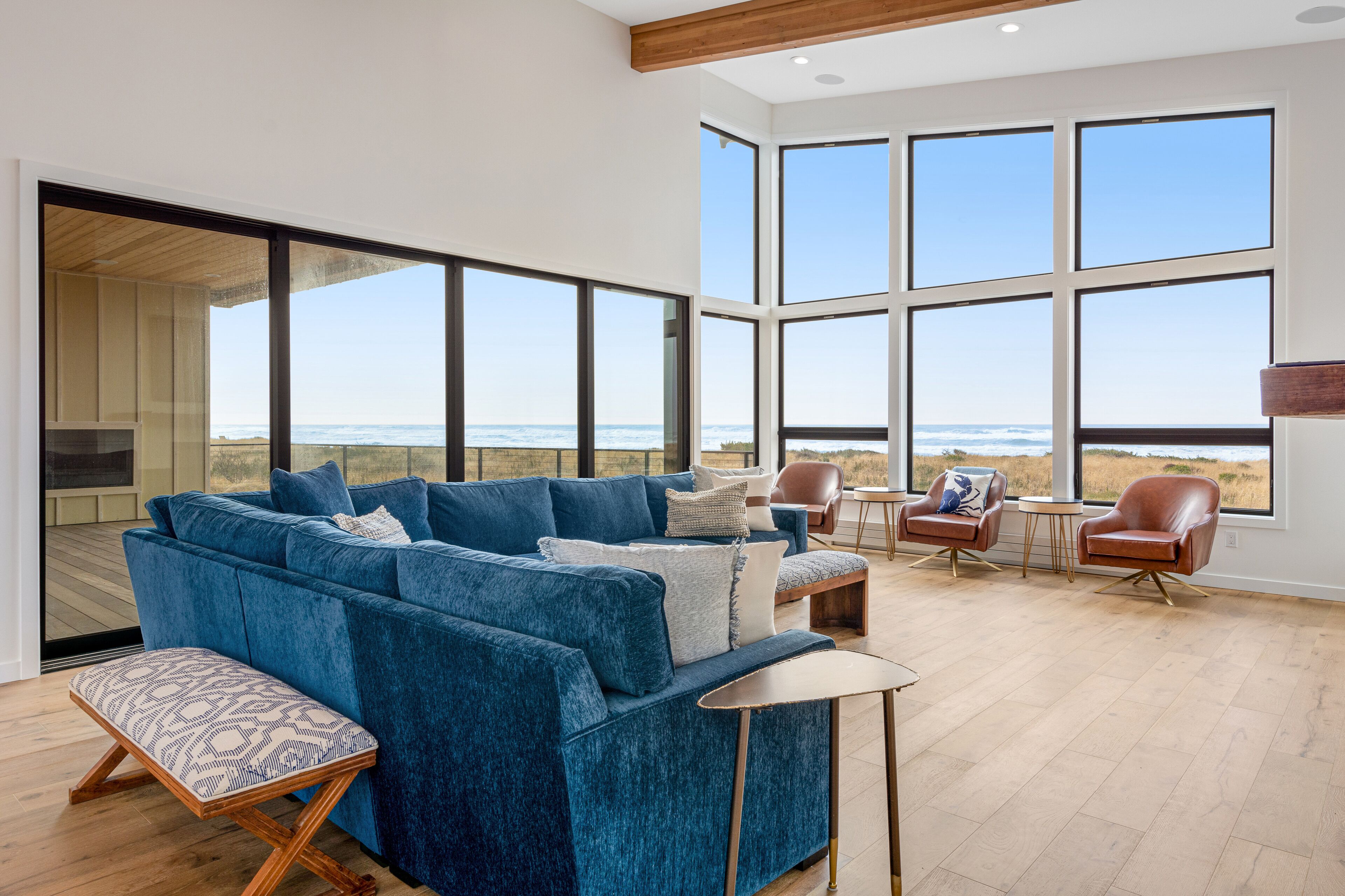 Inviting ocean view home with fireplace, deck, beach access, & washer/dryer