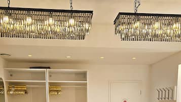 Deluxe Apartment | Living area | 40-inch Smart TV with cable channels, TV, Netflix