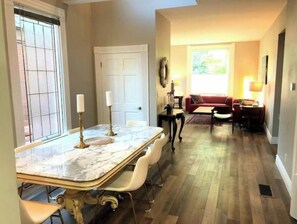 Enjoy meals with friends and family at the dining table, which seats four, in this inviting room.
