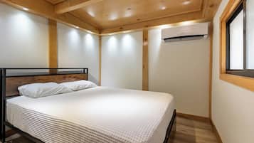 Cabaña Premium, vista al jardín | Ropa de cama de alta calidad y decoración personalizada