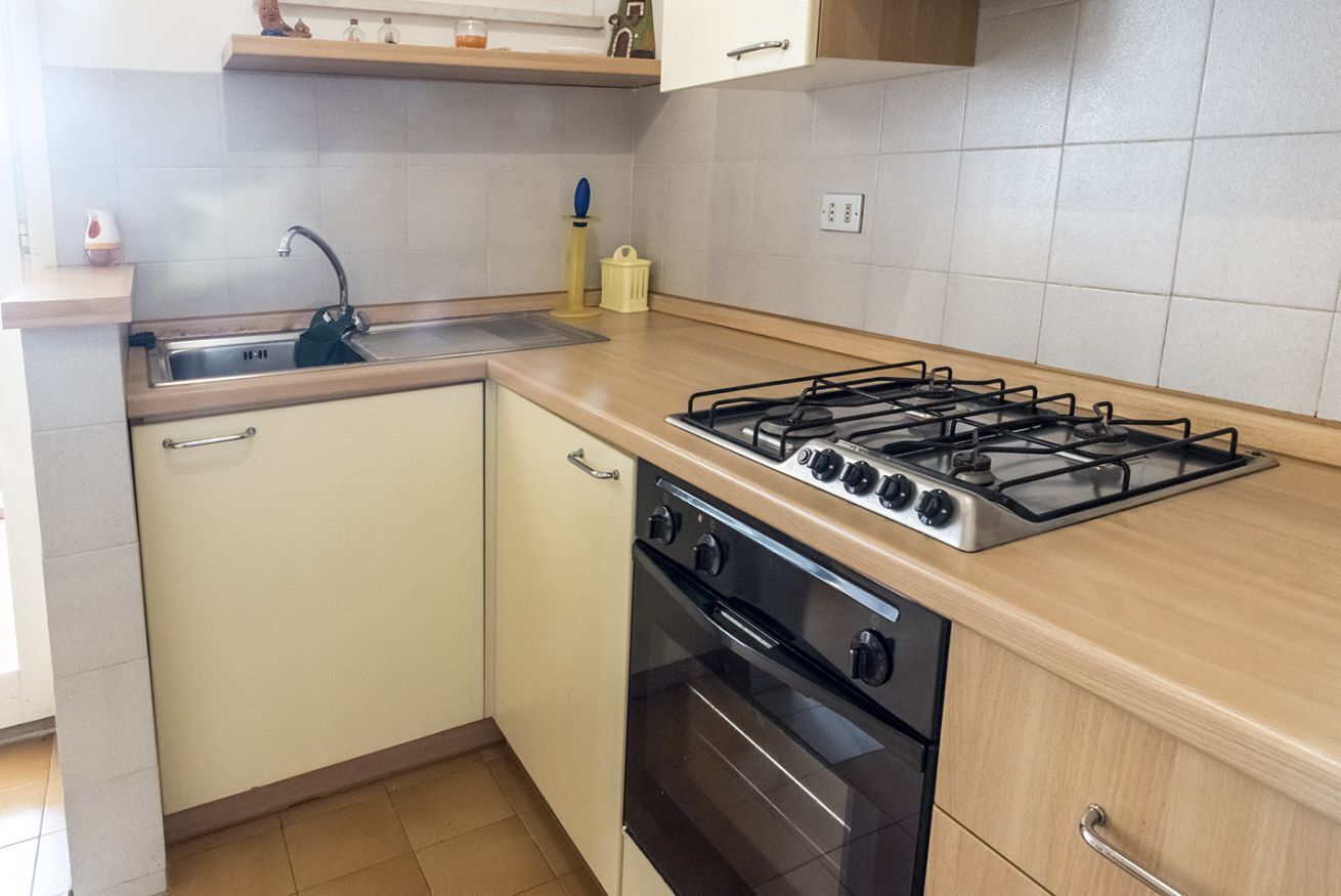 Fridge, oven, dining tables