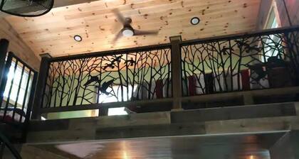 Secluded treehouse with indoor fireplace