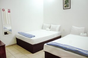 Economy Room, 2 Double Beds | Free WiFi, bed sheets