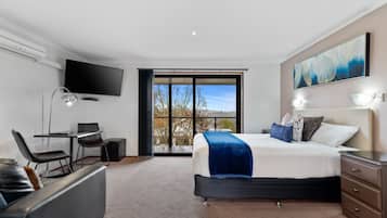 Standard Studio Suite, 1 Queen Bed, Balcony, Garden View (First Floor) | 2 bedrooms, pillow-top beds, iron/ironing board, free WiFi
