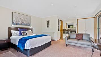 Standard Studio Suite, 1 Queen Bed, Balcony, Garden View (First Floor) | 2 bedrooms, pillow-top beds, iron/ironing board, free WiFi