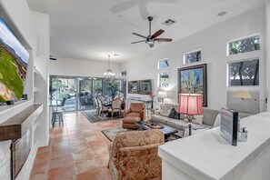 Smart TV, fireplace, books, offices