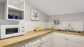 Fridge, microwave, dining tables