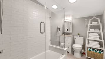 Bathtub, hair dryer, towels