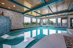 Indoor pool, a heated pool, sun loungers