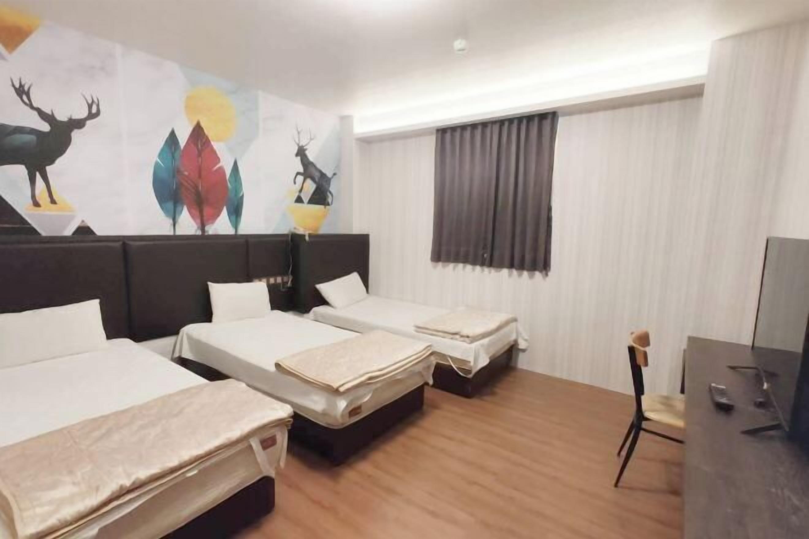 Desk, laptop workspace, free WiFi, bed sheets