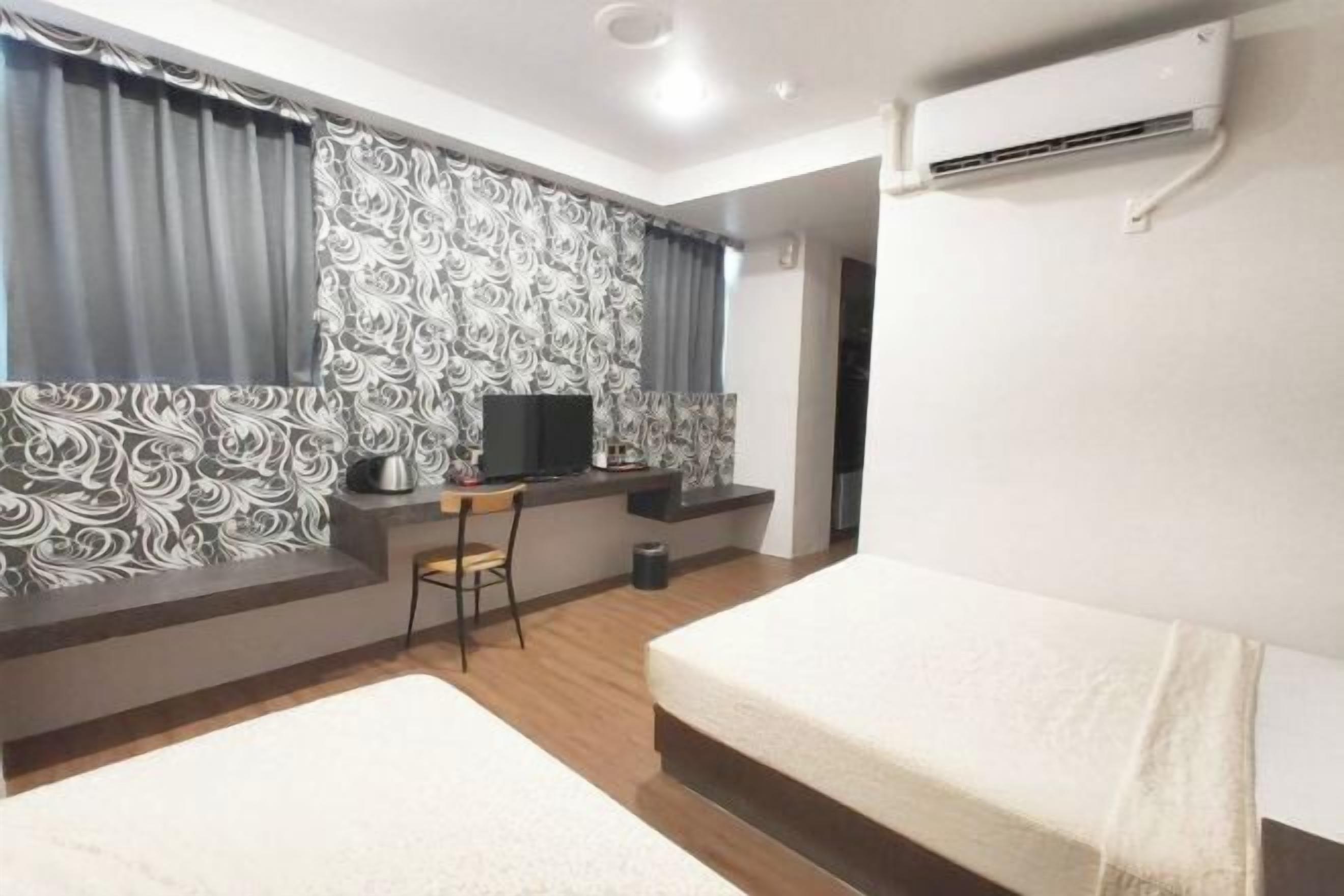 Desk, laptop workspace, free WiFi, bed sheets