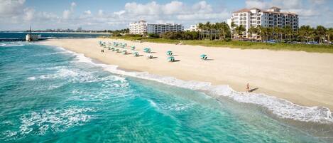 On the beach, sun-loungers, beach towels