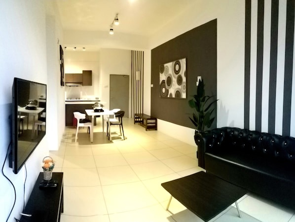 Family Apartment, 3 Bedrooms, Non Smoking, Mountain View | Living area | 36-inch LED TV with cable channels, TV