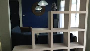 Apartamento família | Área de estar