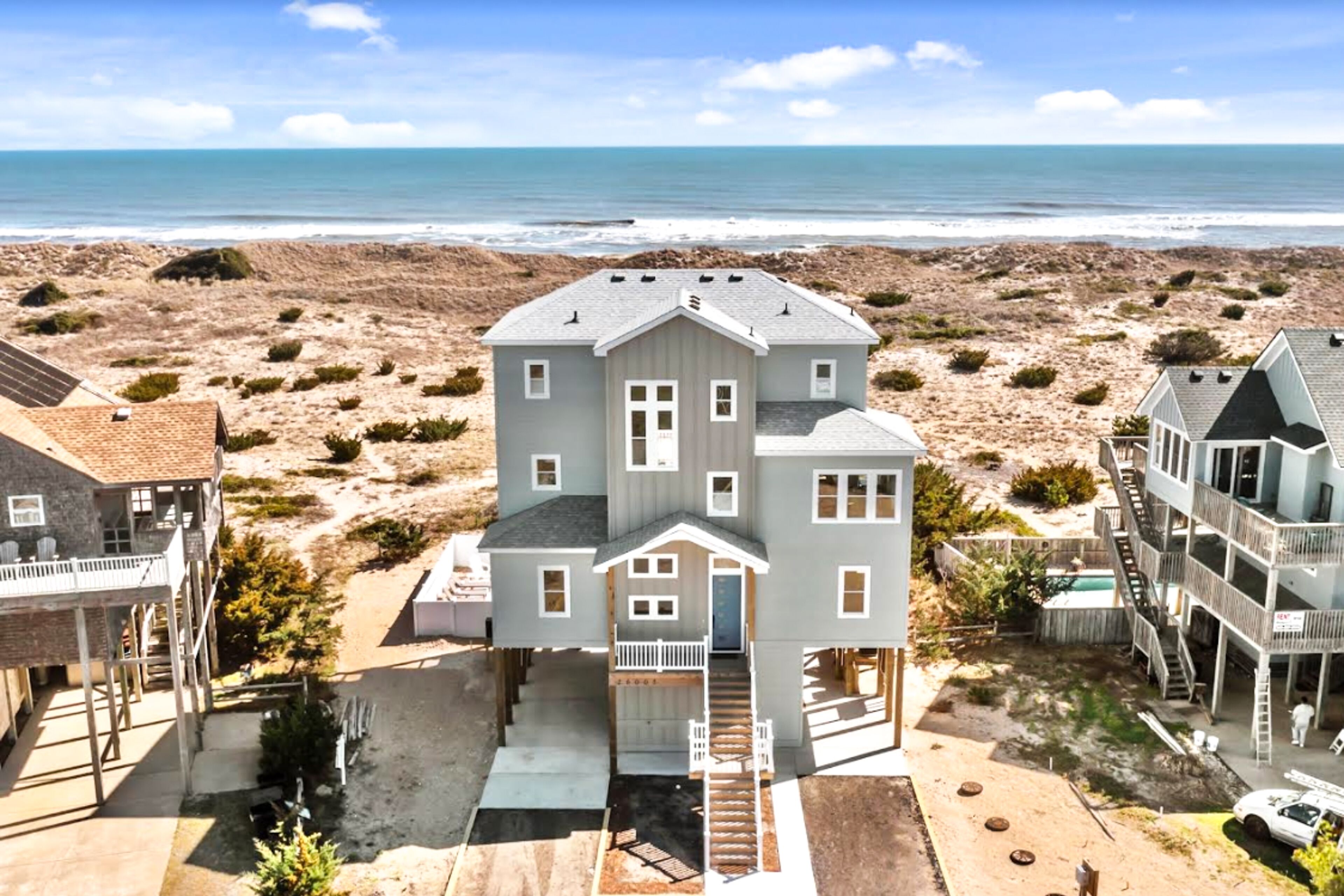 Luxury oceanfront home with views, saltwater pool, hot tub, & elevator