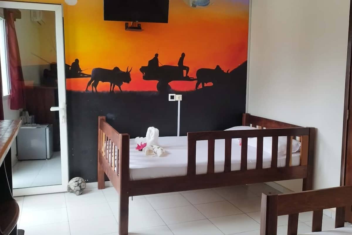 Family Quadruple Room | Minibar, desk, laptop workspace, free WiFi