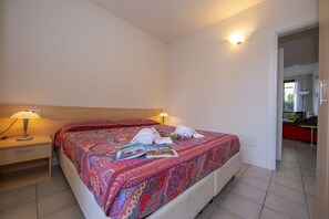 1 غرفة نوم وملاءات أسرّة