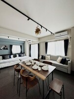 Signature Apartment | Living area | Flat-screen TV