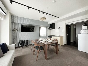 Executive Apartment, 2 Bedrooms, Non Smoking, City View | Living area | Flat-screen TV - NAGOMI (Hiroshima)