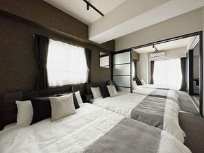Family Apartment, 2 Bedrooms, Non Smoking, City View | Individually decorated, laptop workspace, iron/ironing board, free WiFi