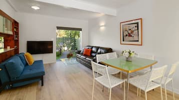 Design House | Living area | 49-inch Smart TV with digital channels, Netflix, streaming services