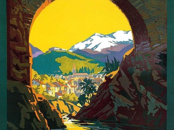 A stylized town with a prominent church, a bridge, and mountains in the background.