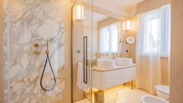 Hair dryer, slippers, bidet, towels