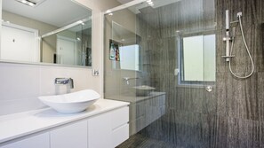Bathtub, hair dryer, towels
