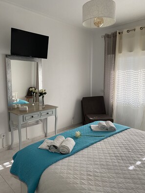 1 habitación, tabla de planchar con plancha, wifi y ropa de cama 