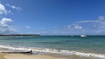On the beach, sun-loungers, beach towels