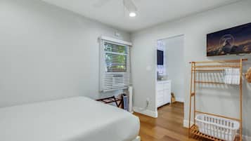 1 bedroom, desk, iron/ironing board, travel cot