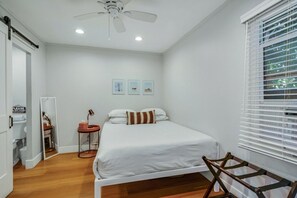 1 bedroom, desk, iron/ironing board, travel crib