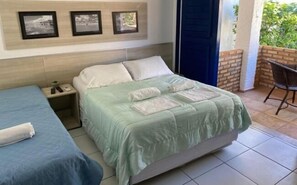 Standard Triple Room, Patio, Ground Floor | Desk, bed sheets - Hotel Praia do Futuro (Fortaleza)