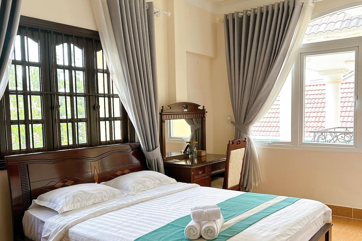 Chambre Double Deluxe, 1 grand lit | Literie hypoallergénique, minibar, coffres-forts dans les chambres