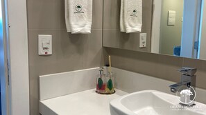 Exclusive Apartment, 1 Bedroom, Mountain View | Bathroom | Separate tub and shower, rainfall showerhead, towels, toilet paper