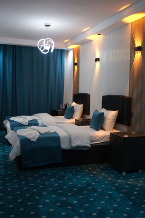 Suite de lujo | Edredón, camas Tempur-Pedic y artículos del minibar gratis