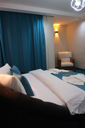 Suite de lujo | Edredón, camas Tempur-Pedic y artículos del minibar gratis