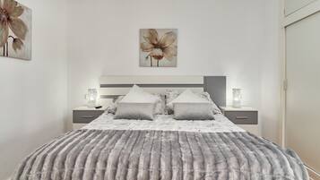 1 dormitorio, tabla de planchar con plancha, wifi gratis y ropa de cama