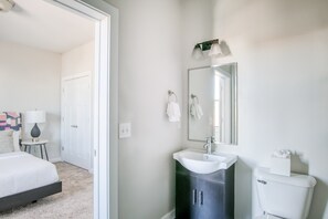 Bathtub, hair dryer, towels