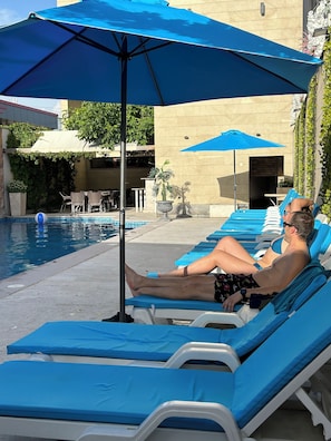Seasonal outdoor pool, pool umbrellas