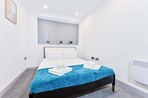 1 chambre, fer et planche Ă repasser, Wi-Fi, draps fournis