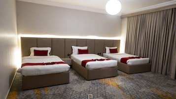 Deluxe Suite, 3 Bedrooms | Peralatan tempat tidur premium, katil Select Comfort, bar mini 