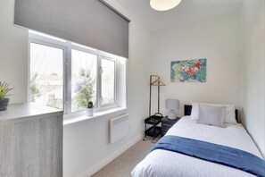 Apartment, Multiple Beds | 2 bedrooms, iron/ironing board, free WiFi, bed sheets