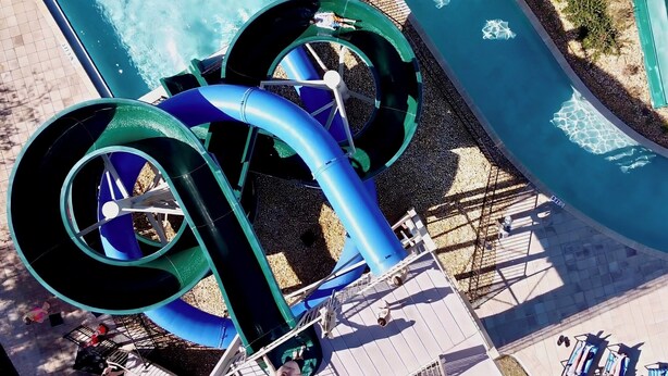 A water slide structure with a pool and a deck area. - WATERPARK! Mickey & Superhero! EPIC Resort Close 2 Disney! 2730 (Kissimmee)