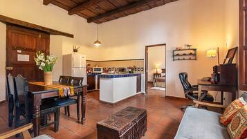 Classic Apartment | Living area | 32-inch flat-screen TV with cable channels, TV