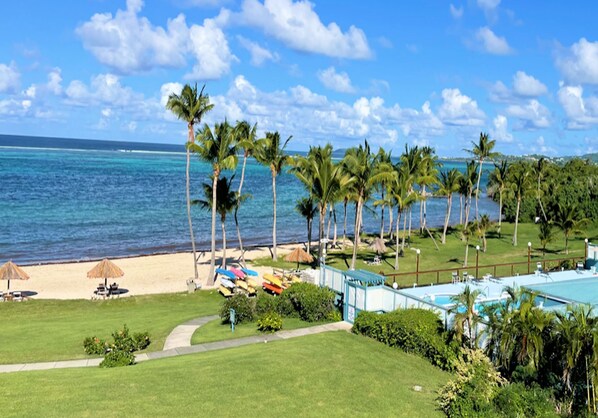 On the beach, sun loungers, beach towels