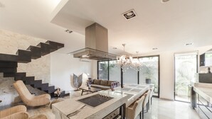 Family Apartment | Private kitchen | Espresso maker, full-size fridge, microwave, stovetop - Black House Aldea Zama (Tulum)