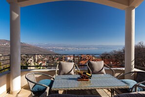 Enjoy a serene view of the city and water from this outdoor space.